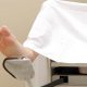 woman in OBGYN stirrups